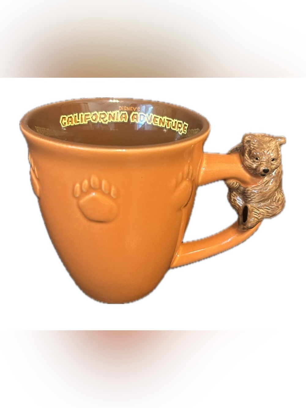 Disney California Adventure Park Ceramic Bear Handle Mug. Orange/Brown/Yellow